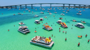 🌊 The Ultimate Pontoon Paradise: How to Conquer Crab Island Like a Pro "Aerial view of Crab Island's turquoise waters with anchored colorful pontoon boats, people socializing in shallow water, and a festive aquatic atmosphere in Florida sunshine."